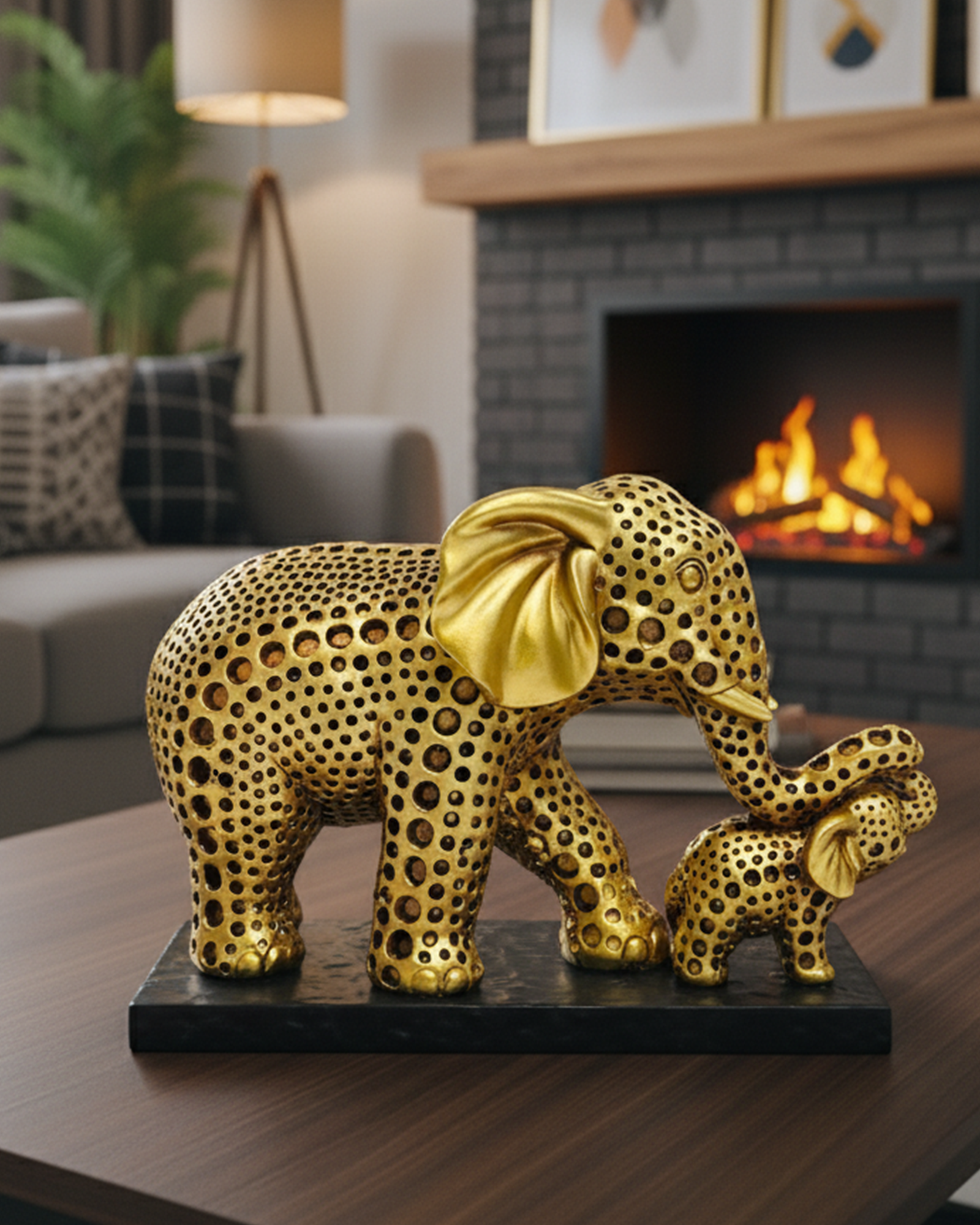 Gold elephant figurines on a table in a cozy living room with a fireplace.